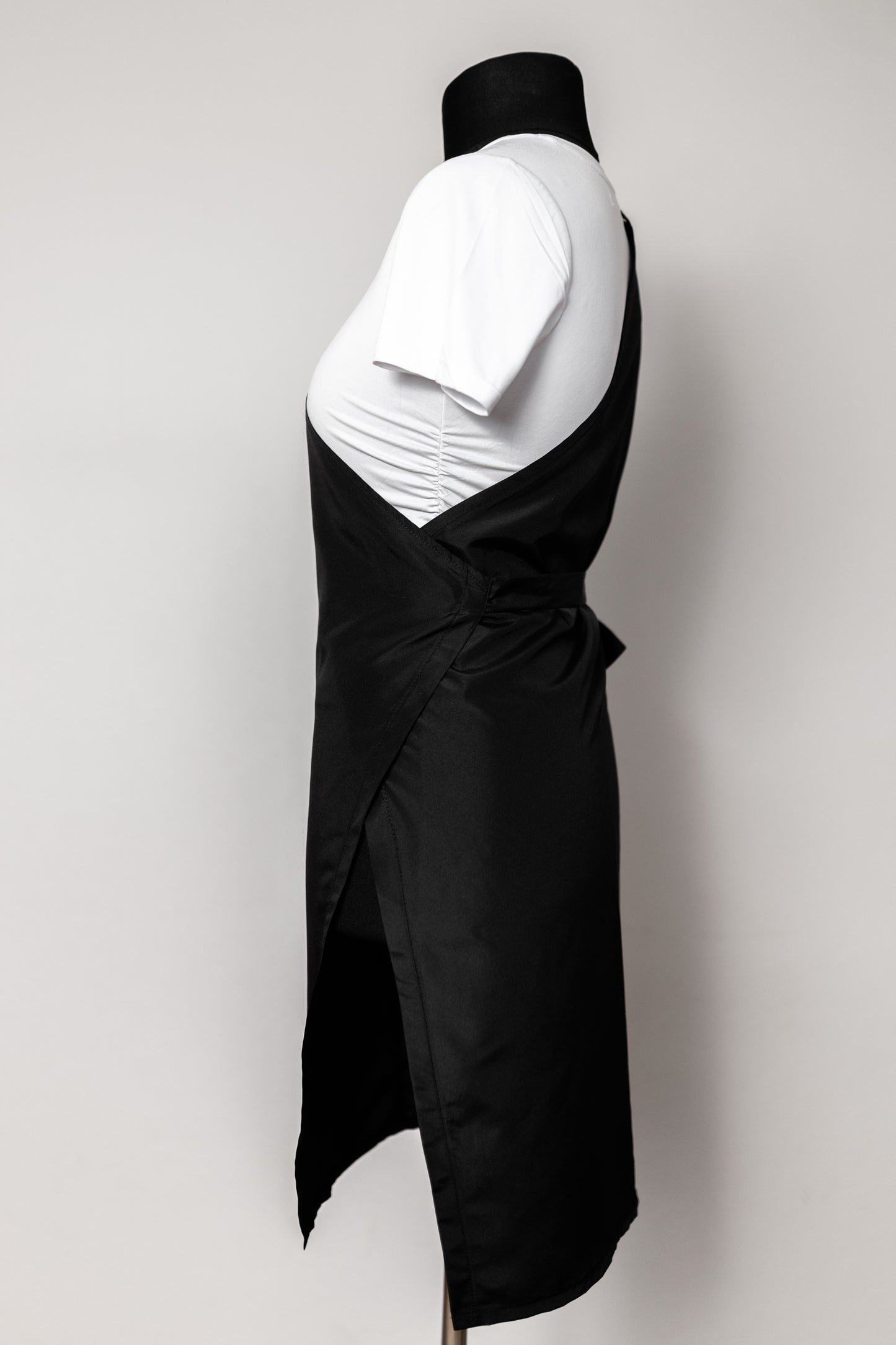 Asimetrisks friziera tērps ar kabatu