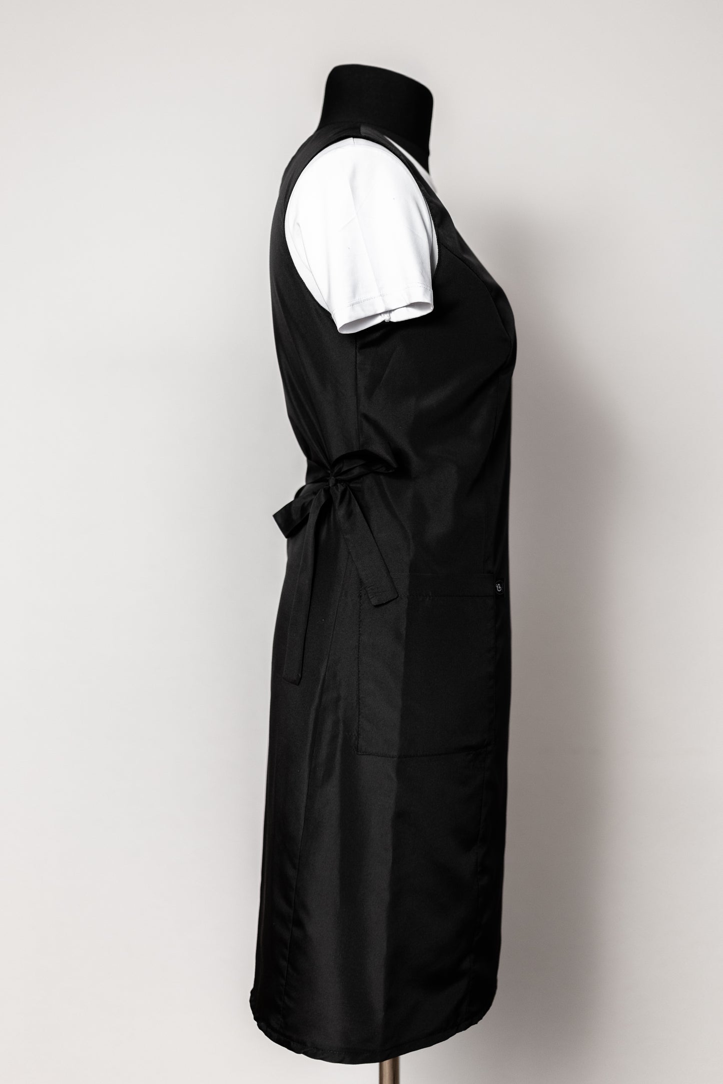 Asimetrisks friziera tērps ar kabatu